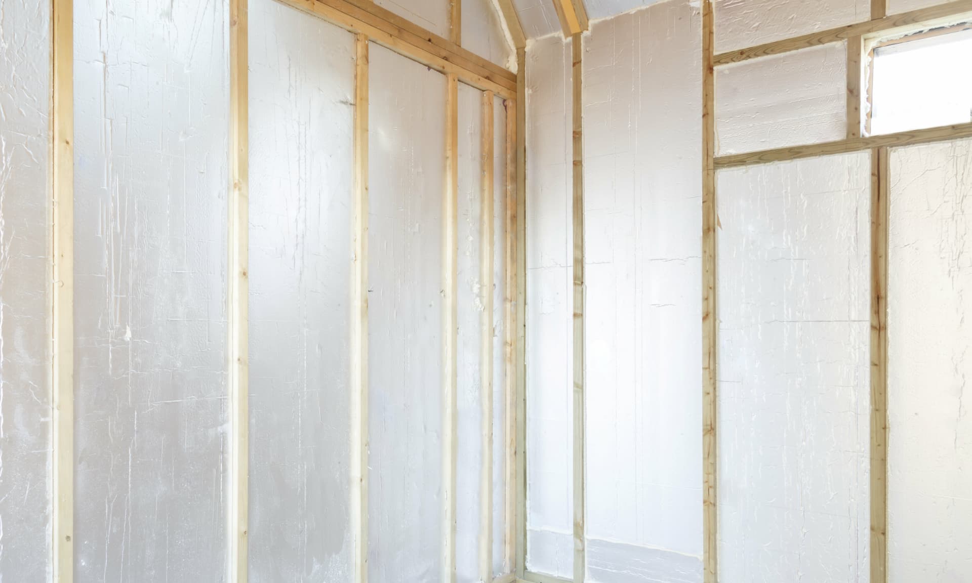 Foil-faced PIR insulation in a garden room wall